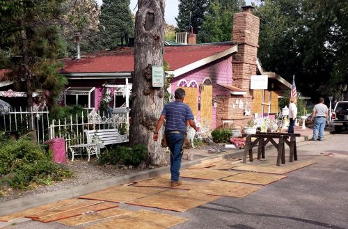Workers at the Horton House after fire, October 1, 2015.